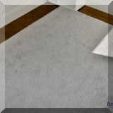 DR06. Gray rug measures approx. 9'3” x 11'2” 